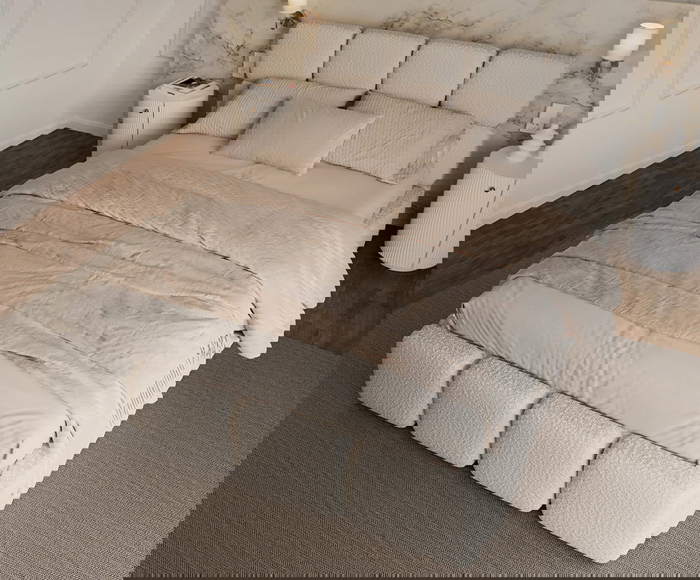 Čalúnená posteľ DELICATO 140x200 cm Krémová Boucle s úložným priestorom kovový rošt