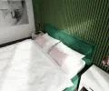 Čalouněná postel CARO 160x200 s kovovým zdvižným roštem ZELENÁ