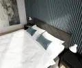 Čalouněná postel CARO 180x200 s kovovým zdvižným roštem ČERNÁ