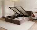 Čalouněná postel FRESIA 120x200 s kovovým zdvižným roštem HNĚDÁ TRINITY