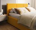 Čalouněná postel FRESIA 140x200cm Žlutá Paris s úložným prostorem kovový rošt
